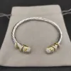 Strängar David Manyur American Luxury Brand Jewellery Högre kvalitet 925 Silver Twisted Wire och Diamond Armband för kvinnor Charmig gåva
