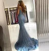 Vestidos de luxo para festa sexig blå sjöjungfru aftonklänningar spaghettirem v hals ärmlös pärlor spetsar high-end formell prom klänning design