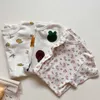 Rompers 2024 Summer New Baby krótkie rękaw Romper Nowonarodzony chłopiec kreskówka Kwiatowy kombinezon bawełna niemowlę cienkie puste piżamę 0-24m H240423