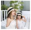 Chapeaux de paille d'été pour plage maman et fille Sun Panama Simple Bow Kid Girl Lady Sunshade Bohemia Vocation Cap 240415