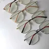 Sunglasses designer New frame glasses g flat lens female Ni same fashion decorative mirror irregular metal 0396 9YEK