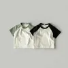 T-shirty 2023 Summer New Baby Short Sleeve T koszule bawełna dzieci swobodne koszula moda niemowlę solidne dno topy do chłopców ubrania H240423