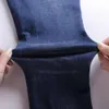 Jeans super hauts femmes avec des pieds élastiques printemps et automne 2024 Nouvelle version minceur et pantalon de crayon à ajustement serré pour femmes