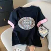 女性のTシャツebaihui中国の刺繍デザイン女性Tシャツパンバックル半袖レディースシャツ夏特別にユニークなティー