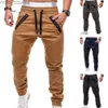 Damskie dżinsy sprężynowe i jesienne męskie spodnie cargo elastyczne kieszonki talii Modne męskie misy wygodne multi kieszeni spodni YQ240423