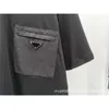 High -End -trendige Marke Pra P Family halb Ärmeln mit Reißverschluss in Tasche und dreieckige Logo Buchstaben für Männer Frauen runder Nacken kurzes T -Shirt lose sitzend