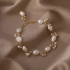 STRANDS FRANSE RETRO -STIJL NATUURLIJKE PEARL Luxe armbanden Women Fashion Ins Style Persoonlijkheid Charm Bracelet Sieraden Accessoires Geschenk