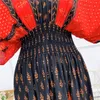 Plażowy elegancki elegancki retro bohemian narodowy vneck elastyczna talia duża huśtawka drukowana letnia spódnica kobieta Mid Dress Ubrania 240419