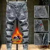 Kvinnors jeans höst och vinterborstad ull tjock plysch denim smal fit elastiska jeans män denim arbetskläder varor denim lyx tält bomullsbyxor yq240423