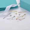 Designer Trend Tiffays Nuovi orecchini a nodo a diamante pieno placcato con 925 ago d'argento 18k oro vero oro d'oro squisito fiocco di alto livello