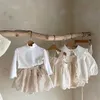 Shorts 2023 Nieuwe babymeisje kanten geborduurde vaste peuter rokken katoen pasgeboren prinses 0-24m H240423