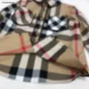 Nowe dzieci designerskie ubrania Kieszonkowa koszula z długim rękawem Rozmiar 100-150 cm dziewczęta z szachownictwa nadrukowane bluzki kardigan bluzki 24 kwietnia