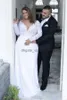 2020 bon marché plus taille une ligne robes de mariée V couche appliques en dentelle pleine manches longues creux d'illusion de dossier de bride