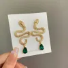 Ohrringe Vintage Gold Farbe übertrieben schlange ohrringe modische grüne Stein Schlangenclip an Ohrringen ohne Piercing for Women Party