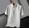 Designers de bordados de pônei camisas de vestido masculinas Brands de camisa xadrez casual de moda masculino masculino slim fit shirts m-3xl