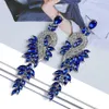 Dangano design del lampadario Orecchini a pennaglie per donne Foglie a catena cavala in metallo di lusso Eleganti foglie di Crystal Brincos Accessori per le orecchie di gioielleria D240323