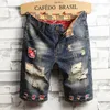 Summer Men Denim Shorts Vintage gescheurde korte jeans streetwear gat mannelijke merkkleding 240412