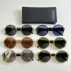 Kvinnlig designer rundram solglasögon med metallram och acetatfiberben A95074 Fashionabla retro kvinnor och män avancerade solglasögon anti UV