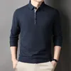 Män långärmad solid casual polo skjortor vårhöst lös streetwear manliga kläder skarvade lapel pläd affärskontor toppar 240416