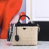 Hot Selling Grass Woven Bag Beach Bag Icare Maxi Designer äkta läderstrån Tygväska Kvinnor lyxig gräs vävt grönsakskorg enskild axelväska crossbody väska