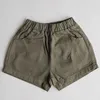 Shorts Childrens Sommershorts mit soliden elastischen Taille und Strandtaschen für 7M-7t Kinder lässig lockere koreanische Kleidung H240423