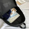 Sırt çantası gündelik mektup sırt çantası kadınlar için basit büyük kapasiteli seyahat okulu çantası Kore tarzı tuval genç kızlar mochila