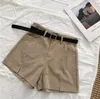 Shorts pour femmes coréens chic d'été hauteur hauteur solide côté décontracté divisé la jambe large cargaison avec les châssis élégant court