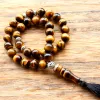 Abbigliamento 10 mm Tiger Eye Stone Tasel Ciondolo 33 perle di preghiera perle islamiche musulmane Tasbih Allah Mohammed Rosario per donne uomini