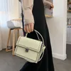 Drawstring 2024 Elegante vrouwen Fashion Tassen Patent Leather Schouder Messenger Bag Lady Small Crossbody Vrouwelijke klinknagel bovenhandle