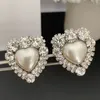 Luxe dames oorbellen sieraden wit goud kleur bling clear cz crystal hart oorbellen clips op voor vrouwen feest bruiloft designer oorbellen oorbellen