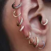 Brincos Lobo Piercing Ear Brincos para mulheres Minimalistas de ouro redondo cor de zircão de zircão Huggie Huggie Jóias TRAGUS daith KCE202