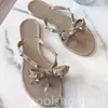 Flip Flops Summer Beach Shoes Rivets sandali a fiocchi Nuovo Fashio Europe States Designer Designer Scarpe da donna Sandali