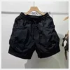 السراويل القصيرة السائبة Harajuku Streetwear Multi-Pocket Fashion Shorts Quick Dry Outdoor Litness Shorts عالية الجودة 240423