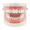 Two hollow hip-hop braces on top and six hollow ones on bottom 18k gold-plated vampire fangs Halloween gold dentures