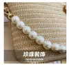 Torby na ramię Pearl Portable Słomka Koreańska Trendy Trendy Baget Bag Simple Bow Messenger Beach Ręcznie tkany torebka