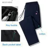 Autumn Pants Men Fitness Sportswear Tracksuit Elastic midja Sweatpants Bomullsbyxor Lossa Gym Jogger Track Pants Mens M- 8xl 240423