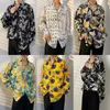 Chemises décontractées pour hommes Polos Polos T-shirts Spring and Automn Floral Shirts Flom for Men and Women Vintage Fashion Ins Shirts à manches longues pour les amoureux