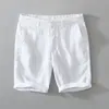 남성 반바지 디자이너 남성용 순수한 린넨 여름 새로운 패션 솔리드 흰색 느슨한 휴가 남자 캐주얼 플러스 사이즈 버튼 플라이 짧은 바지 드롭 오제르