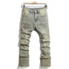 Men de estilo retro de streetwear rasgou calças de jeans finas emendas Hip Hip Hop calça jeans elegante para masculino 240417