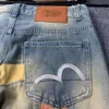 Chaopai Fushen Nya vatten tvättade jeans broderade och tryckta skarvade Jacquard Mandarin Duck Löst raka benbyxor 514676