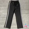 Klassieke zwarte witte geborduurde vlindernaalden naalden hindernissen zijkant strepen Men vrouwen Hiphop Street Casual Sports broek 240420