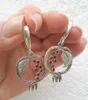 Boucles d'oreilles exquises de lustre en lustre