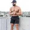 Men na siłownię fitness luźne szorty kulturystyka joggery lato szybkie suche chłodne krótkie spodnie męskie mąki marki plażowej dresowe