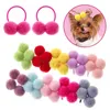 Vêtements pour chiens 20 / 30pcs coiffure arc animal de compagnie de toilettage des arcs colorés de forme en peluche