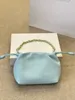 Modeontwerp dames klassieke fuku tas mini soft nappa schapen leer met geplooide ontwerp afneembare donutketen super alles-in-één crossbody tas