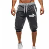 Utländsk handelstrend Men Sports Fifth Pants Drawstring Men Loose Stängande modesportbyxor korta