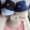 Designer Wide Brim Hatts Bucket Hats m New Min Herr- och kvinnors mode mångsidiga fiskare Hat Sun Protection Hat broderi hattar mössor