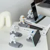 Astronaut Phone Phone Holder Holder Spaceman Scantina Decorazione Smartphone Fantetteria Ornamenti per gli appassionati di spazio 240418