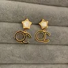 Mujeres Diseñador de lujo Studs Gold Silver Rose Star Stamp Titanium Steel Fashion Pareja Pendientes simples Joyas clásicas Al por mayor