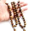 Abbigliamento 10 mm Tiger Eye Stone Tasel Ciondolo 33 perle di preghiera perle islamiche musulmane Tasbih Allah Mohammed Rosario per donne uomini